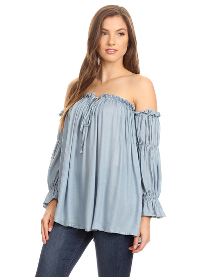 Blusa estilo bohemio semitransparente con hombros descubiertos