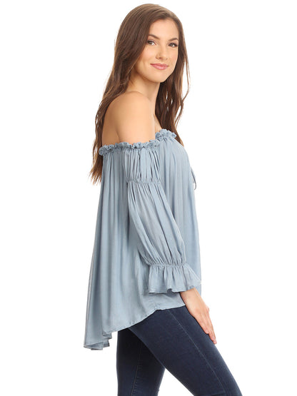 Blusa estilo bohemio semitransparente con hombros descubiertos