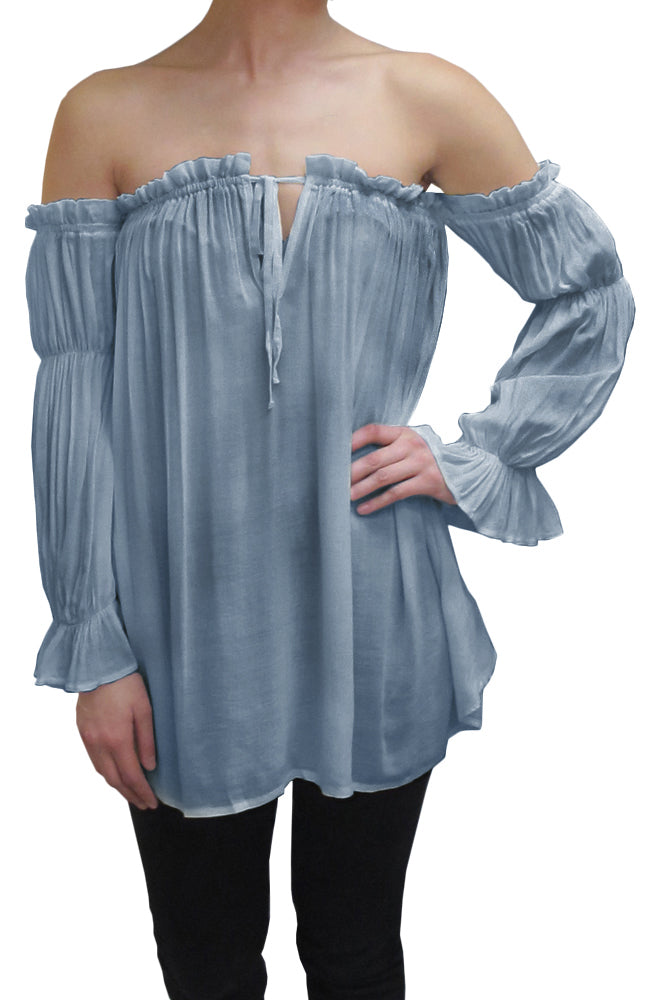Blusa estilo bohemio semitransparente con hombros descubiertos