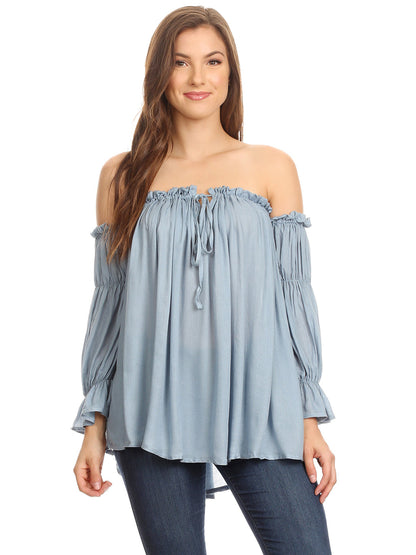 Blusa estilo bohemio semitransparente con hombros descubiertos
