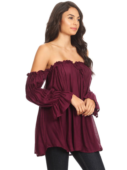 Blusa estilo bohemio semitransparente con hombros descubiertos