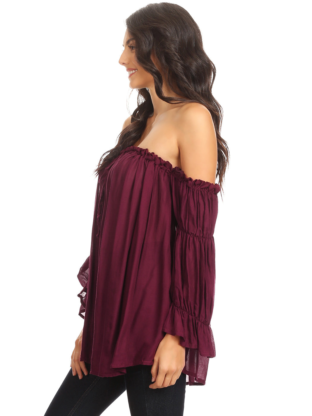 Blusa estilo bohemio semitransparente con hombros descubiertos