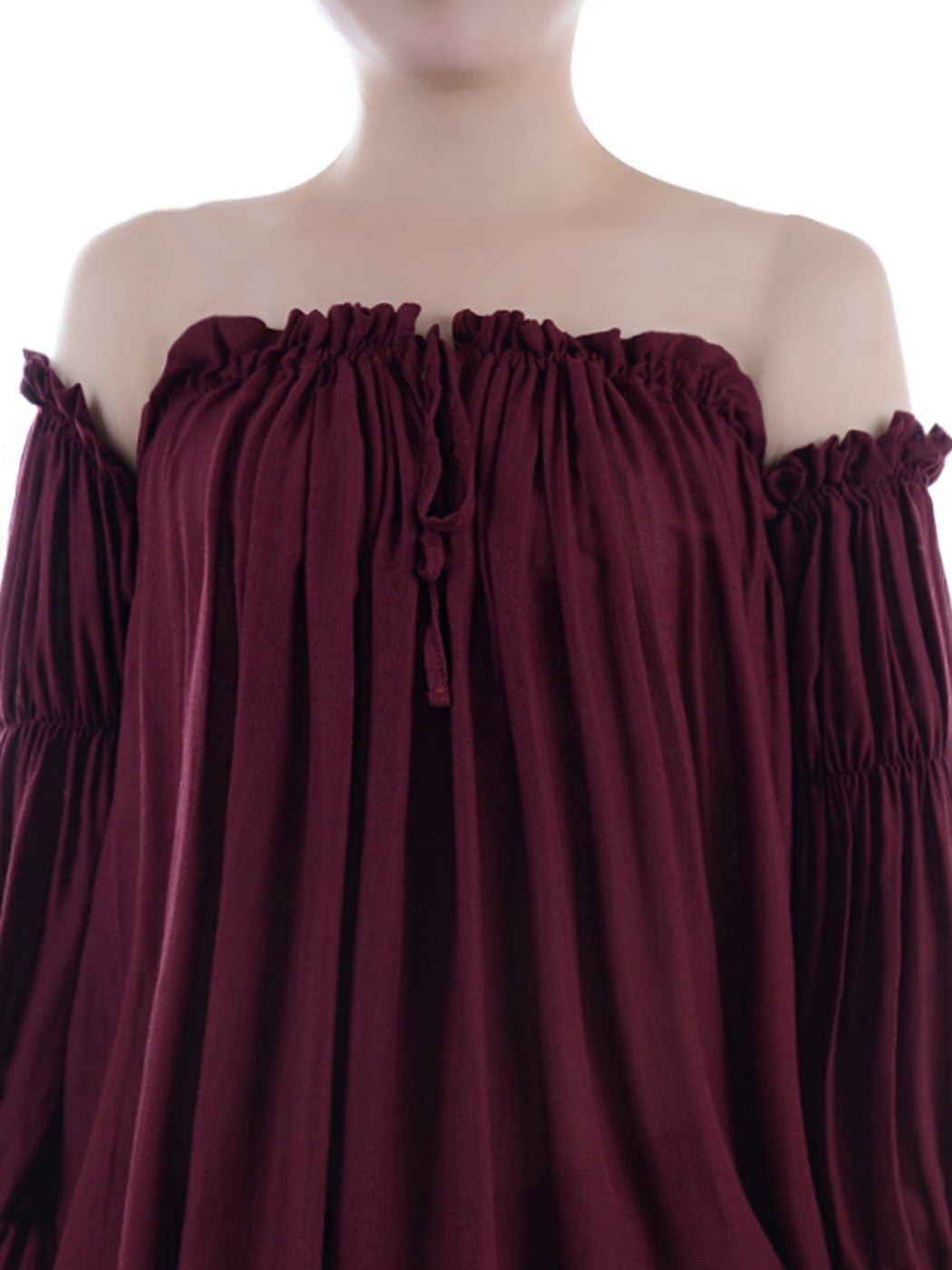 Blusa estilo bohemio semitransparente con hombros descubiertos