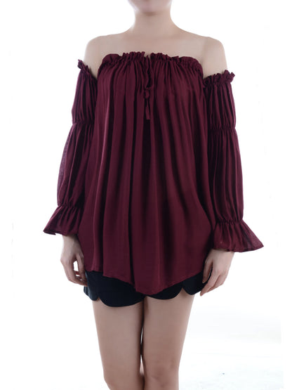 Blusa estilo bohemio semitransparente con hombros descubiertos