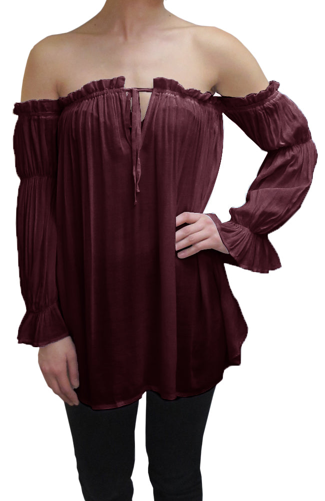 Blusa estilo bohemio semitransparente con hombros descubiertos