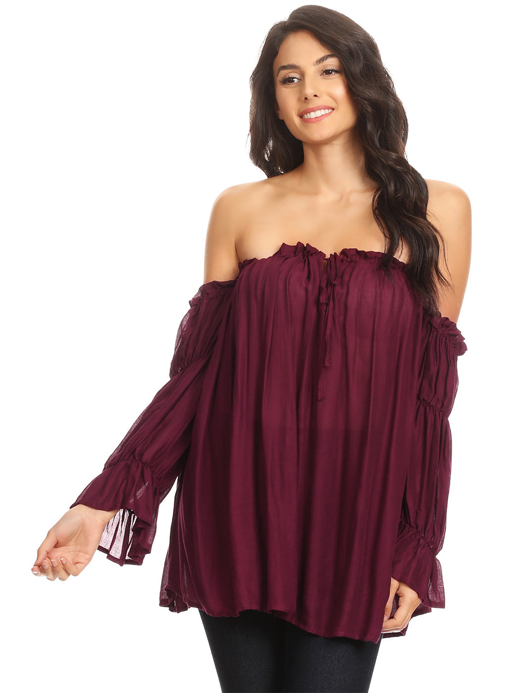 Blusa estilo bohemio semitransparente con hombros descubiertos