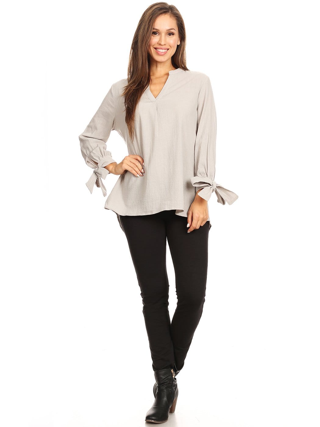 Blusa plisada con mangas abiertas