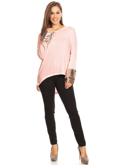 Blusa con mangas largas y puños con lentejuelas brillantes