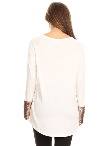 Blusa con mangas largas y puños con lentejuelas brillantes
