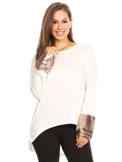 Blusa con mangas largas y puños con lentejuelas brillantes
