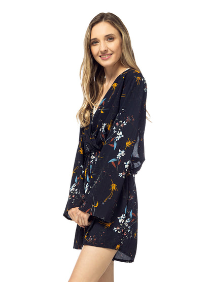 Mono de manga larga sin espalda con estampado floral