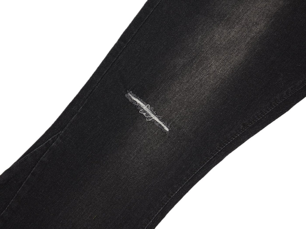 Jeans de mezclilla acampanados largos con cintura elástica y desgastados