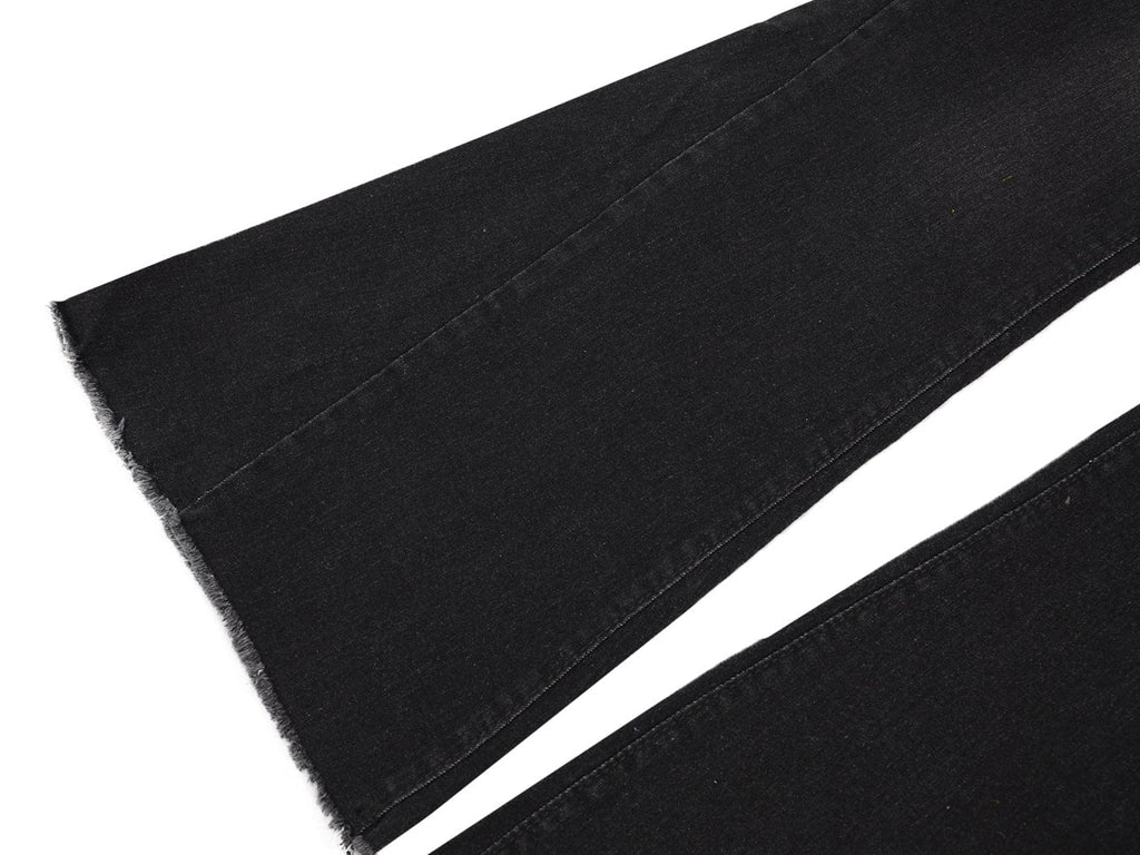Jeans de mezclilla acampanados largos con cintura elástica y desgastados