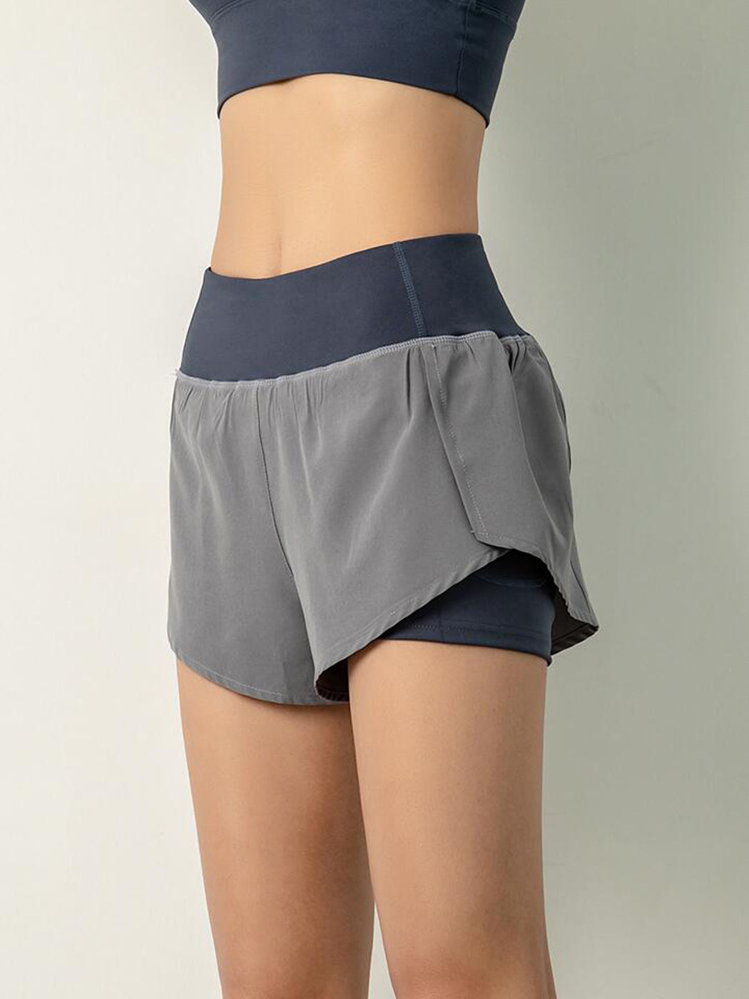 Pantalones cortos de entrenamiento para correr de secado rápido con bolsillo