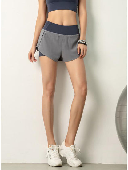 Pantalones cortos de entrenamiento para correr de secado rápido con bolsillo