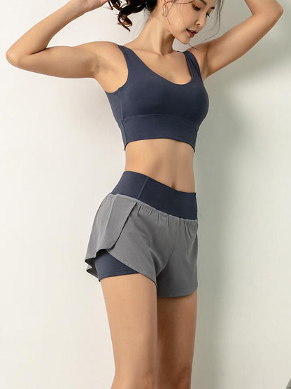 Pantalones cortos de entrenamiento para correr de secado rápido con bolsillo