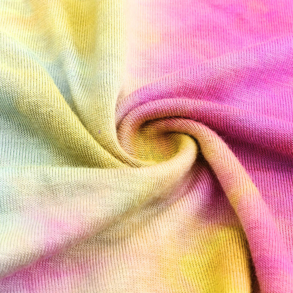 Top holgado de manga corta con estampado tie-dye y rasgado