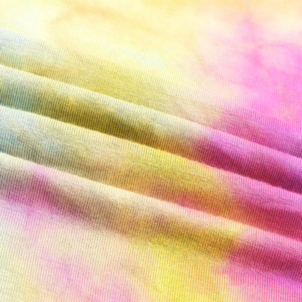 Top holgado de manga corta con estampado tie-dye y rasgado