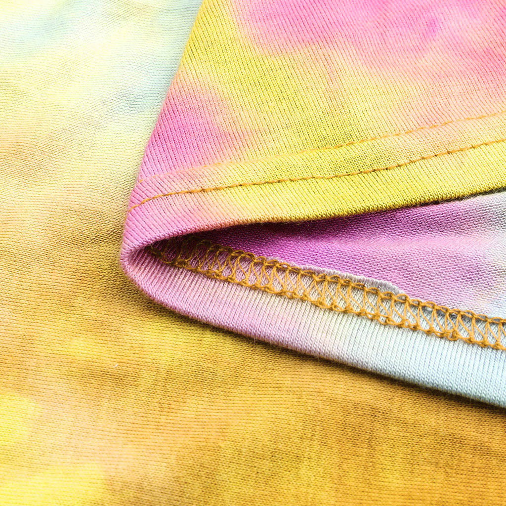 Top holgado de manga corta con estampado tie-dye y rasgado