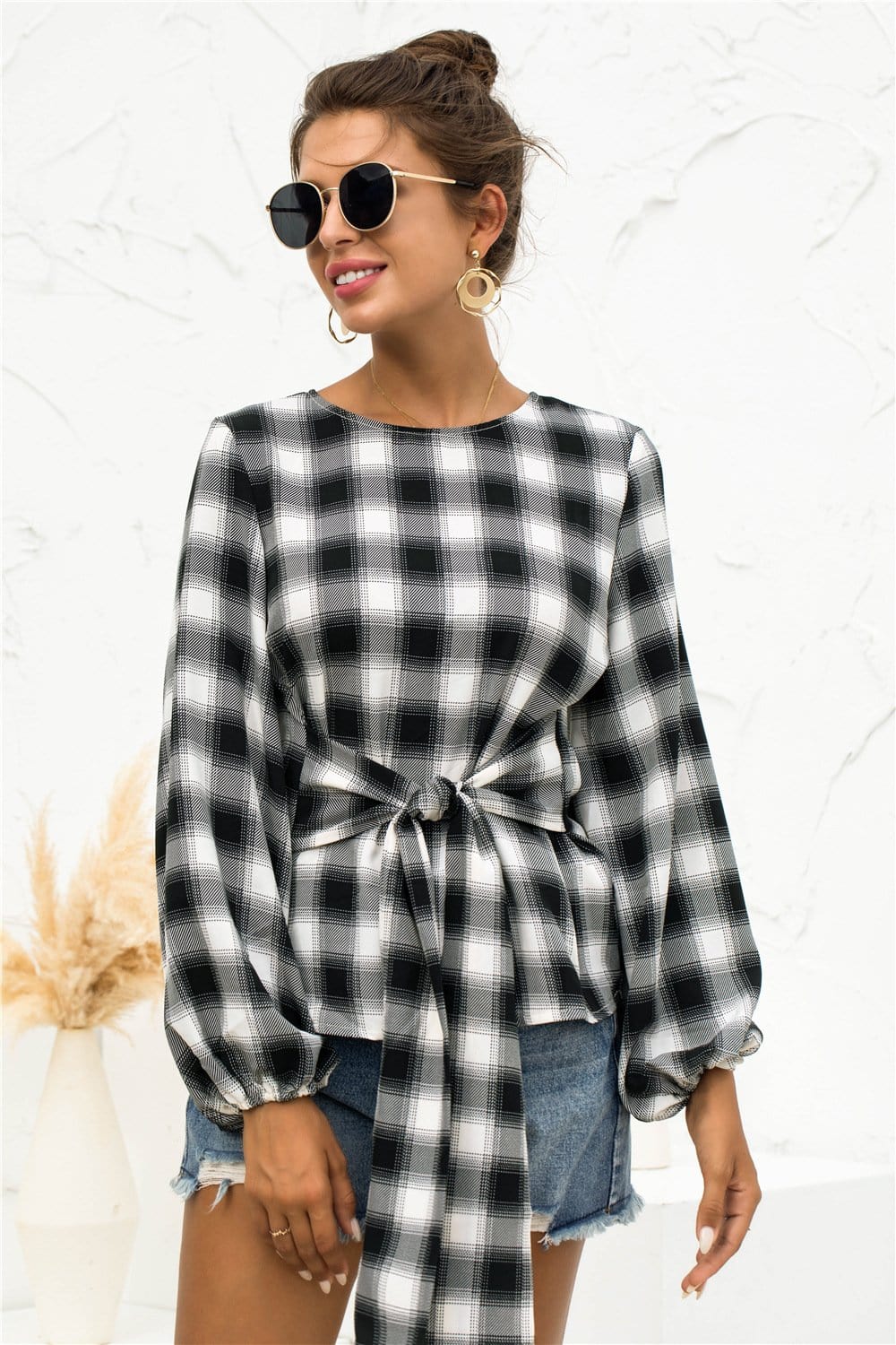 Blusa a cuadros con lazo en la cintura