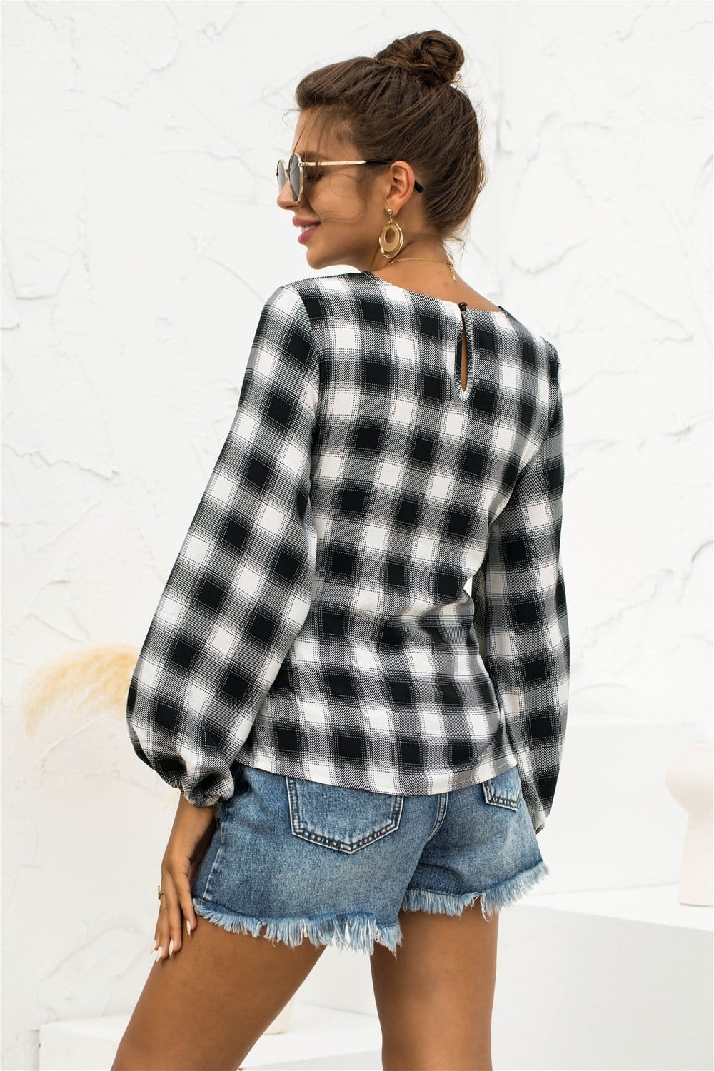 Blusa a cuadros con lazo en la cintura